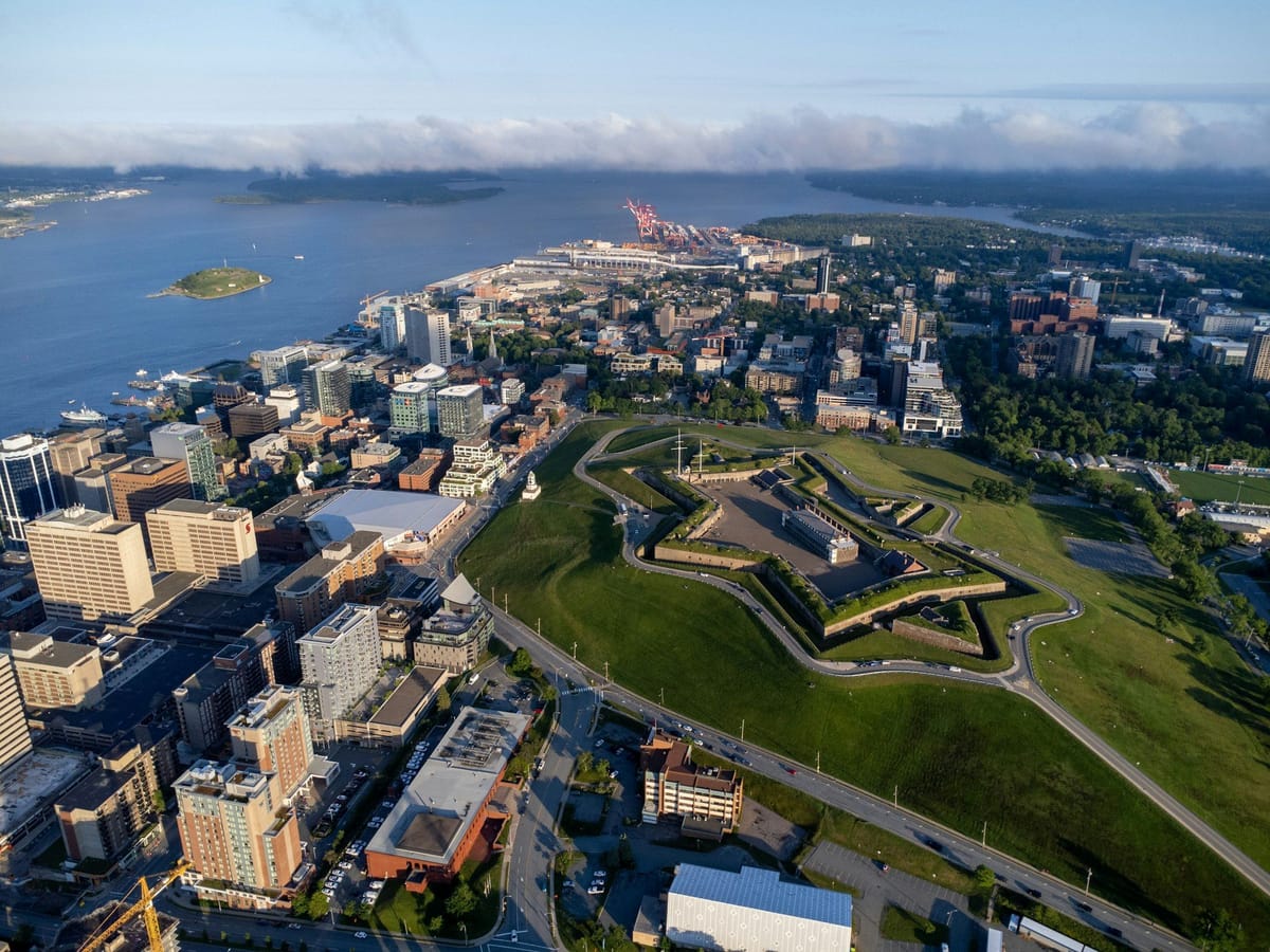 Aerial view of Halifax’s waterfront and downtown, with the Halifax Citadel overlooking the harbour.