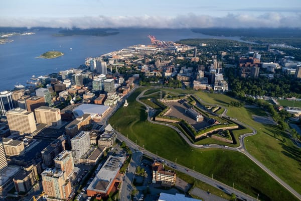 Aerial view of Halifax’s waterfront and downtown, with the Halifax Citadel overlooking the harbour.