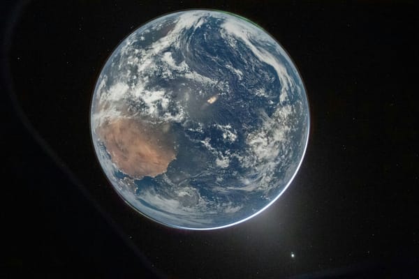 View of Earth from space, with the Indian Ocean, Australia, cloud systems, and the planet’s curved horizon visible.